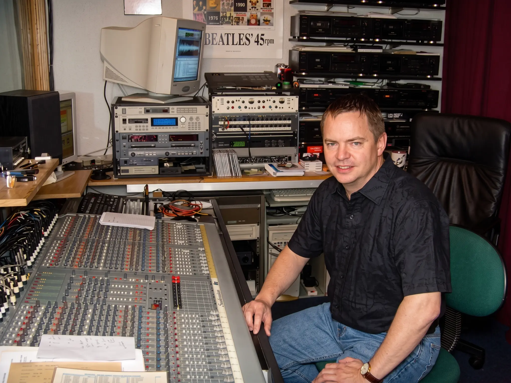 Maxwell Farnon at the mixing desk in his home recording studio